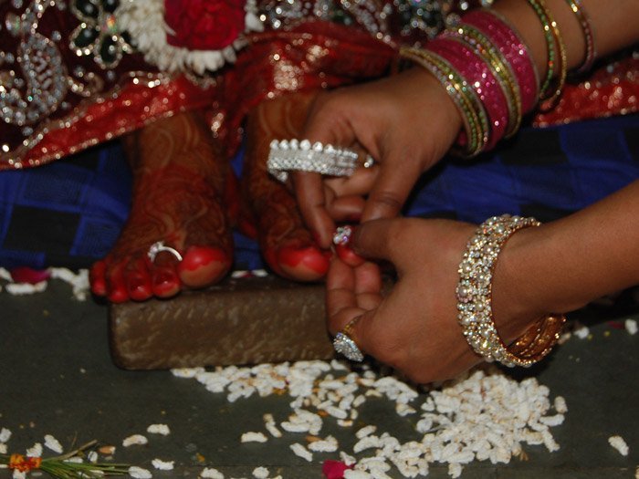 In Indian Customs toe-rings are worn by women at time of wedding